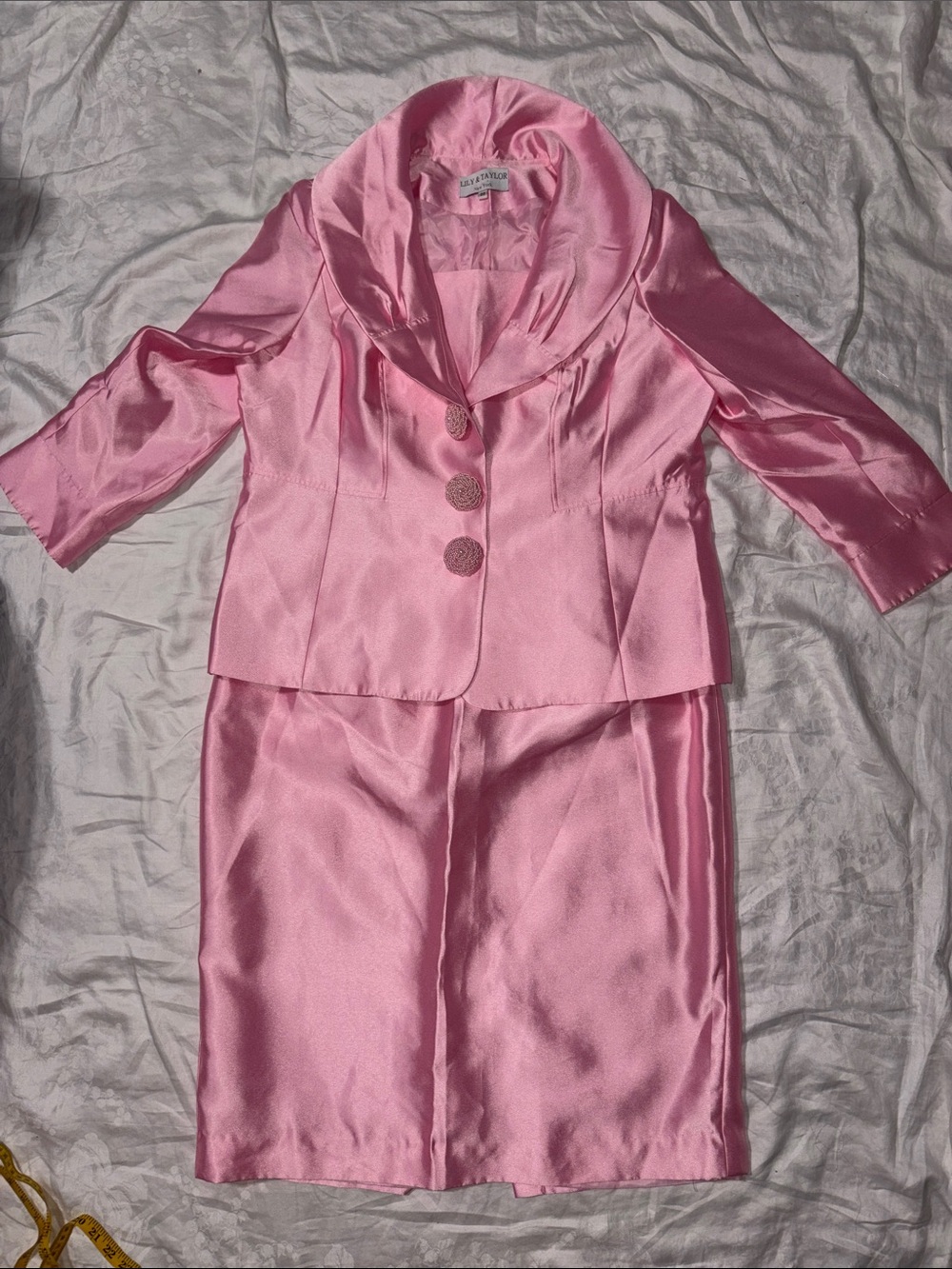 Like new Lily & Taylor Church Suit pink with beaded buttons.
